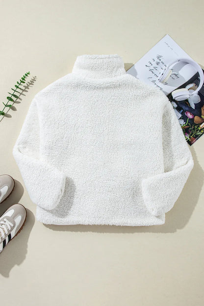 Luchtige damesjas wit met zakken achterkant