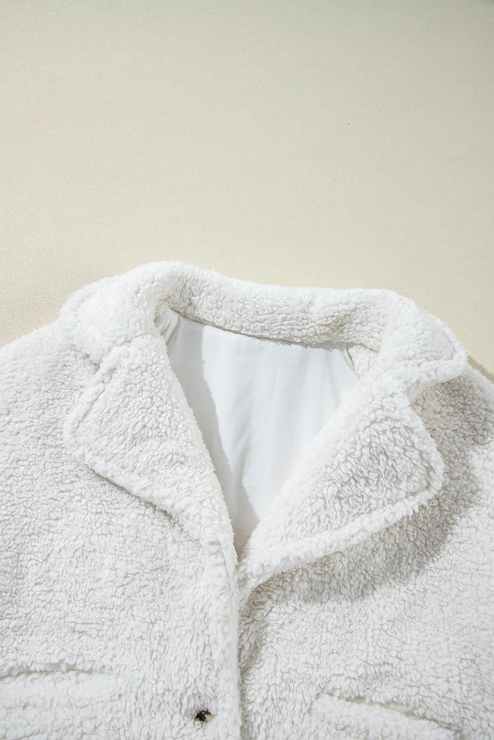 Luchtige damesjas wit met zakken zoom