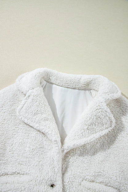 Luchtige damesjas wit met zakken zoom