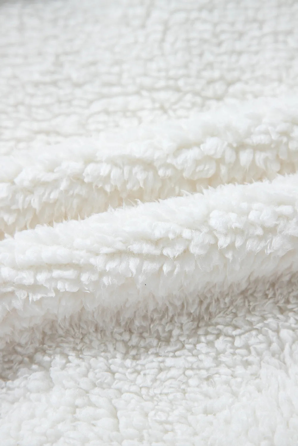 Luchtige damesjas wit met zakken zoom stof